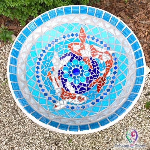 mosaic birdbath with koi fish